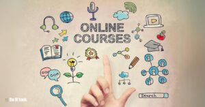 Free Online AI Courses -A hand pointing at a screen with icons - Image Credit Canva