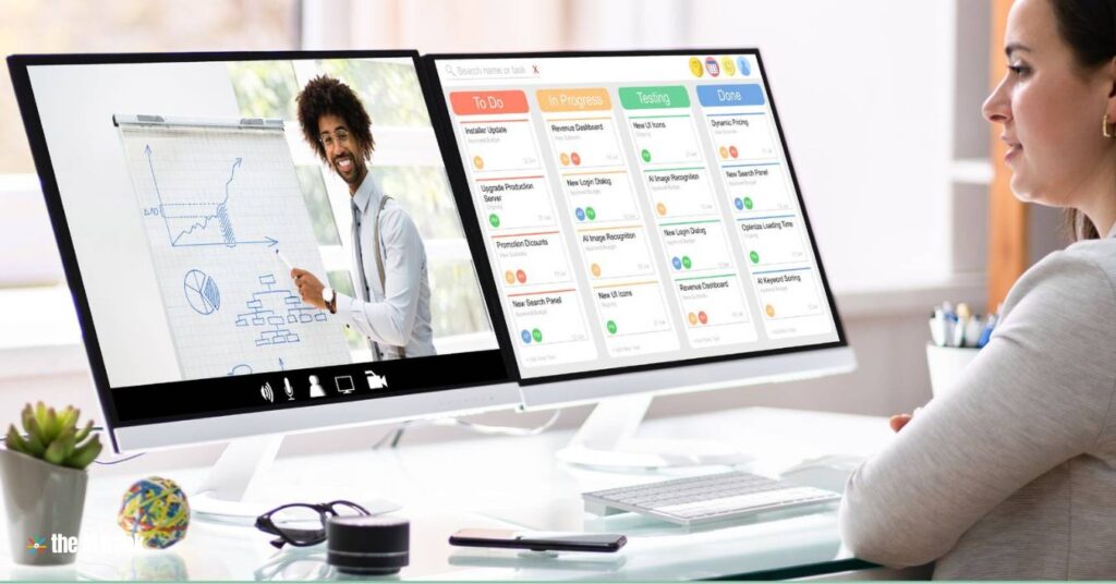 Free Online AI Courses - Woman looking at a computer screen with a man on it - Image Credit Canva